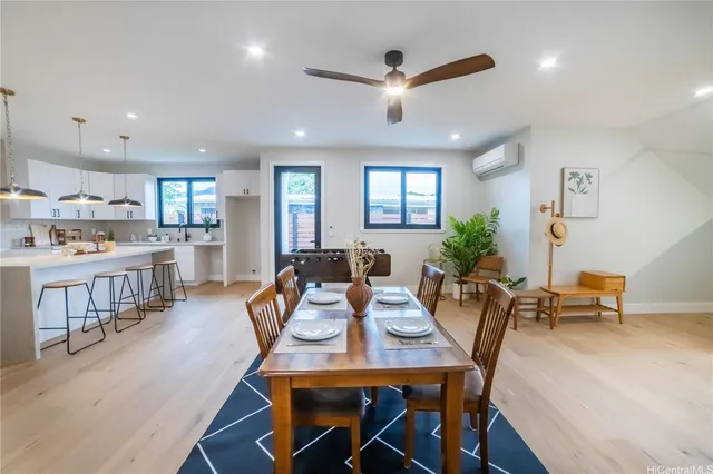 a view of entryway with stairs and wooden floor