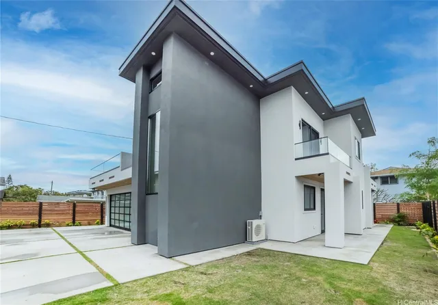 a view of balcony with potted plants