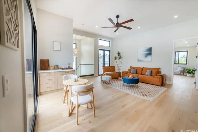 a spacious bedroom with a bed and a table