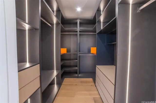 a bathroom with a bathtub a sink and a mirror