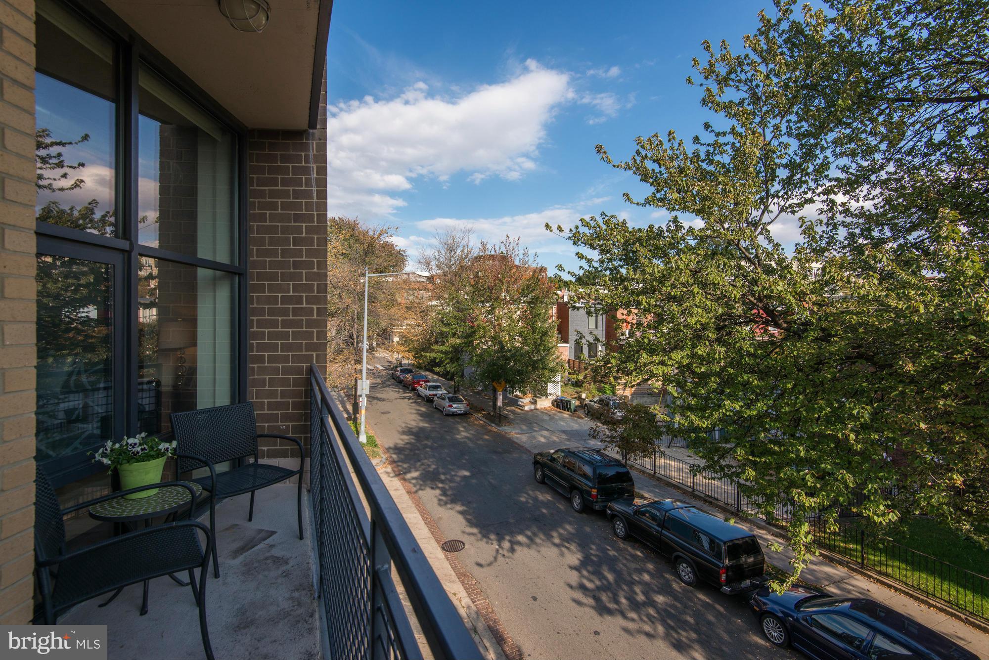 2301 Champlain Street Northwest, Unit 208 Washington, DC 20009 - Photo 25 of 30 a view of a backyard with sitting area