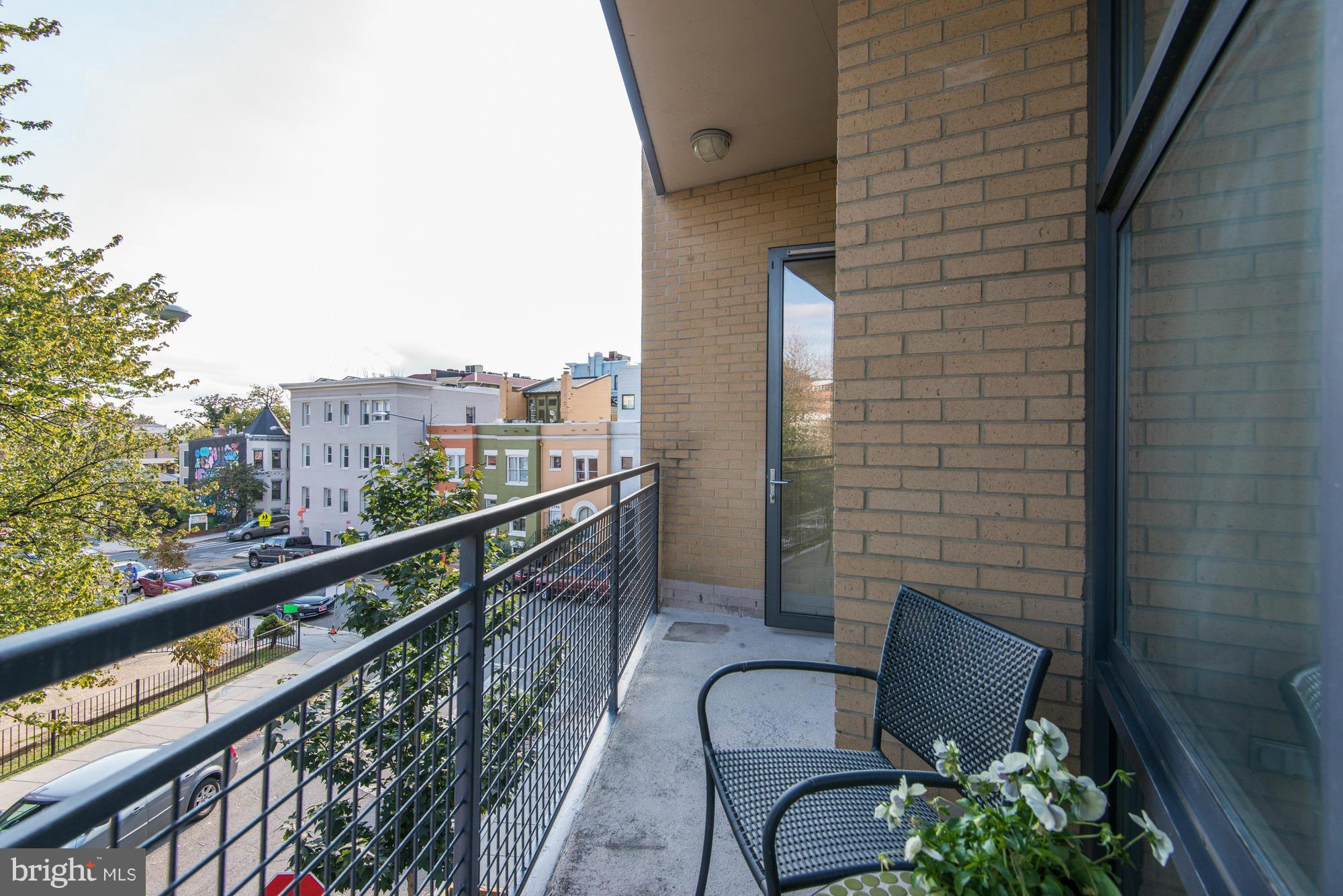 2301 Champlain Street Northwest, Unit 208 Washington, DC 20009 - Photo 26 of 30 a view of balcony with furniture