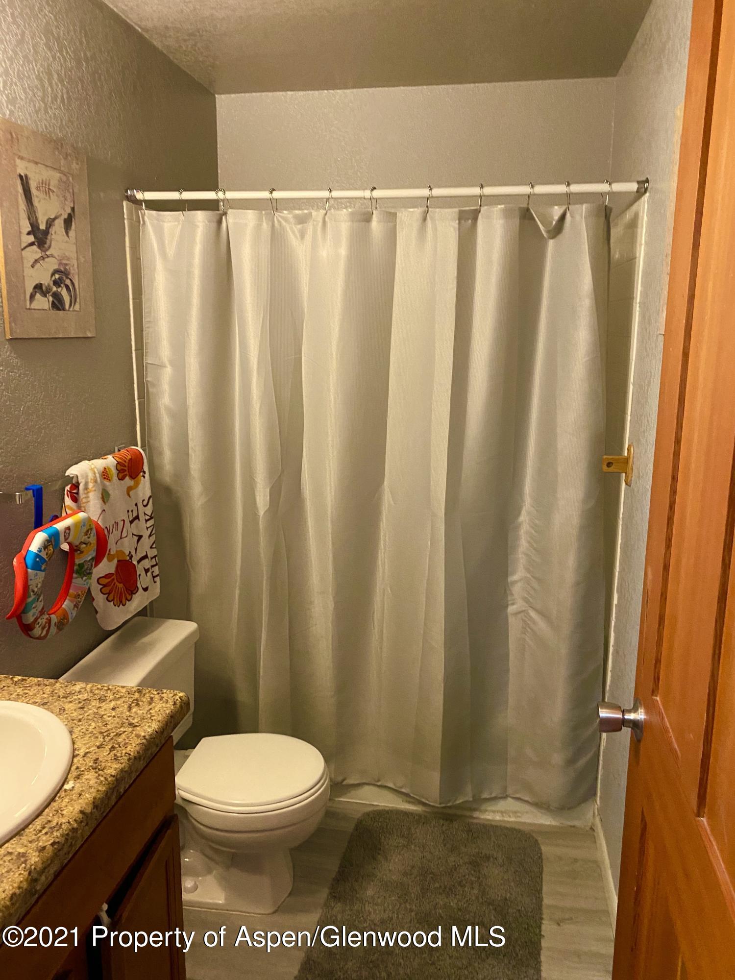 2413 24th Place Rifle, CO 81650 - Photo 13 of 14 Jack & Jill Full Bathroom