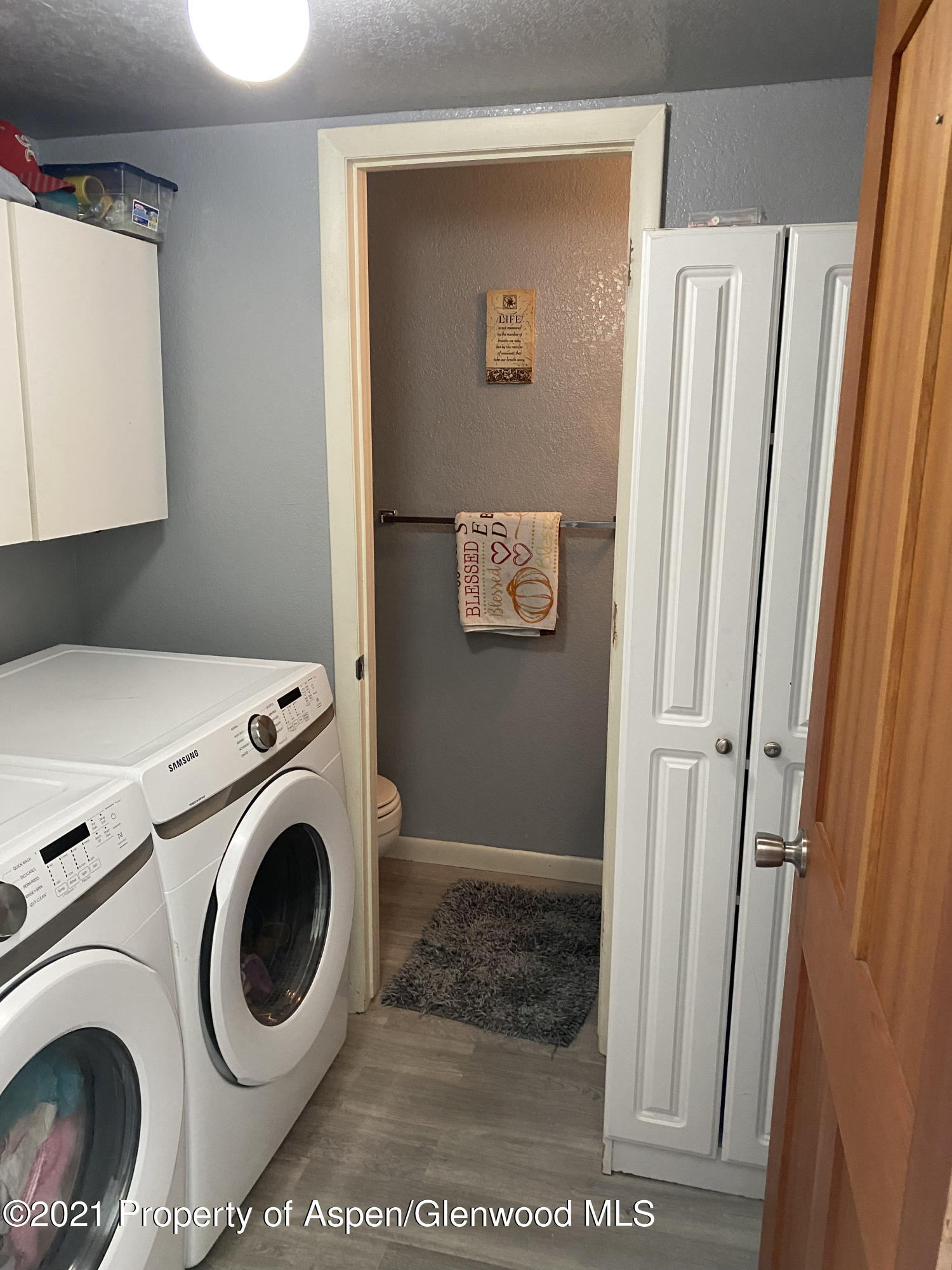 2413 24th Place Rifle, CO 81650 - Photo 10 of 14 Laundry Room and 1:2 Bath Downstairs