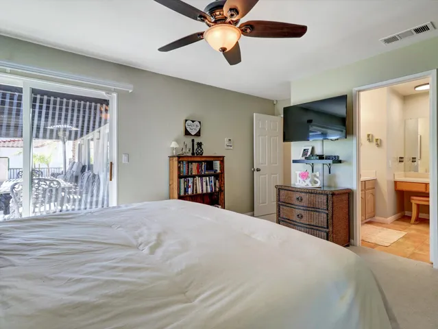 a bathroom with a shower and a toilet