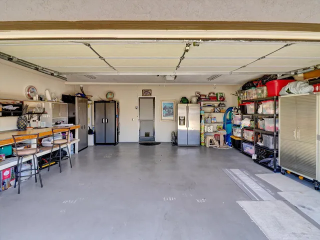 a view of a lake with houses with outdoor space