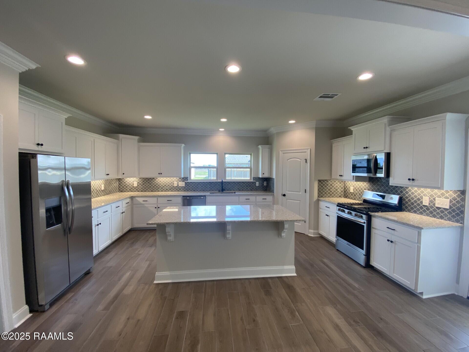 103 Grimmon Road Youngsville, LA 70592 - Photo 2 of 7 KITCHEN
