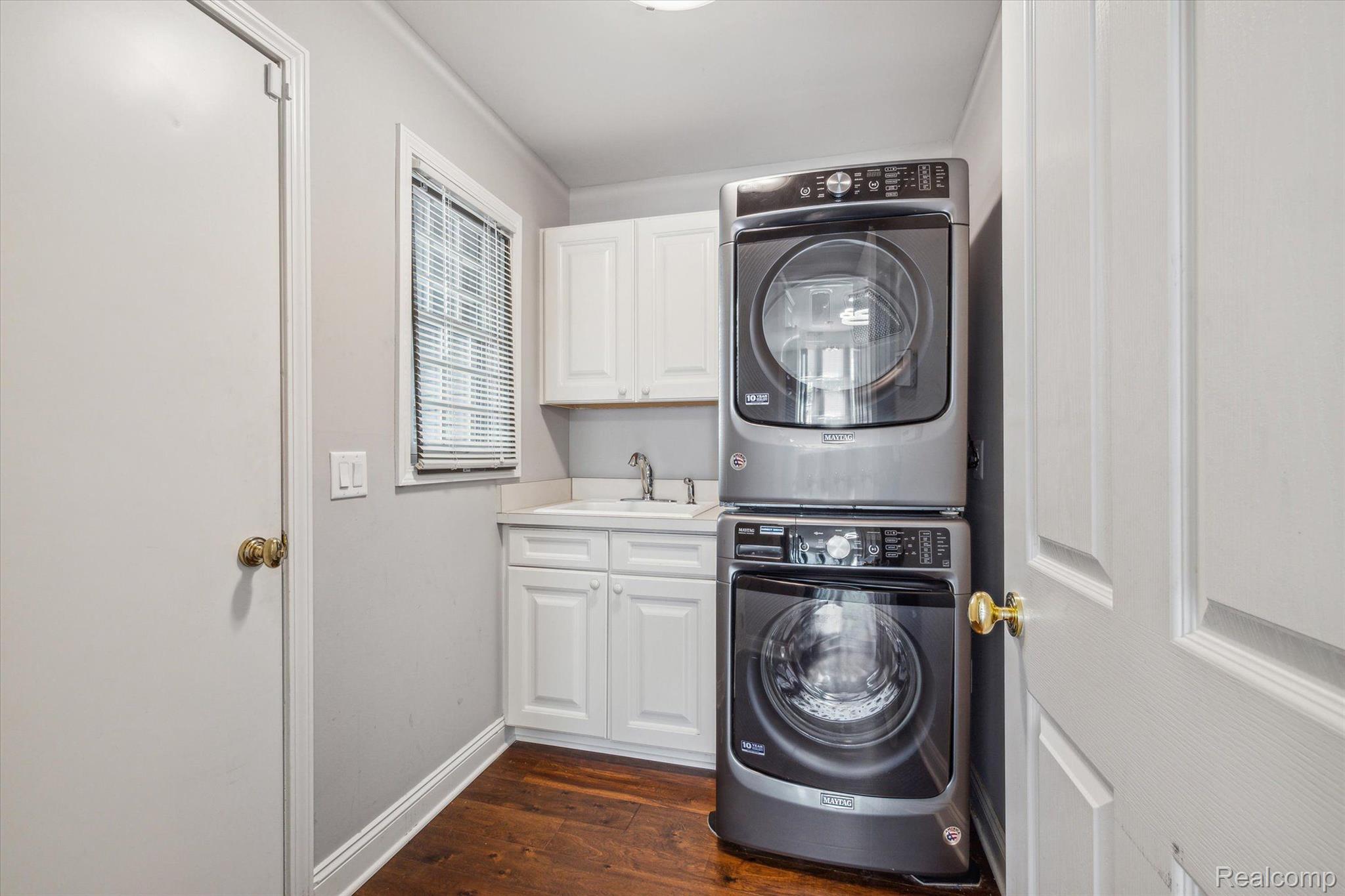 1670 Normandy Road, Unit 10 Clawson, MI 48017 - Photo 15 of 28 Laundry With Stacked Washer and Dryer