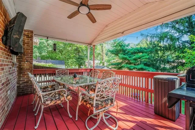 a view of a balcony with furniture