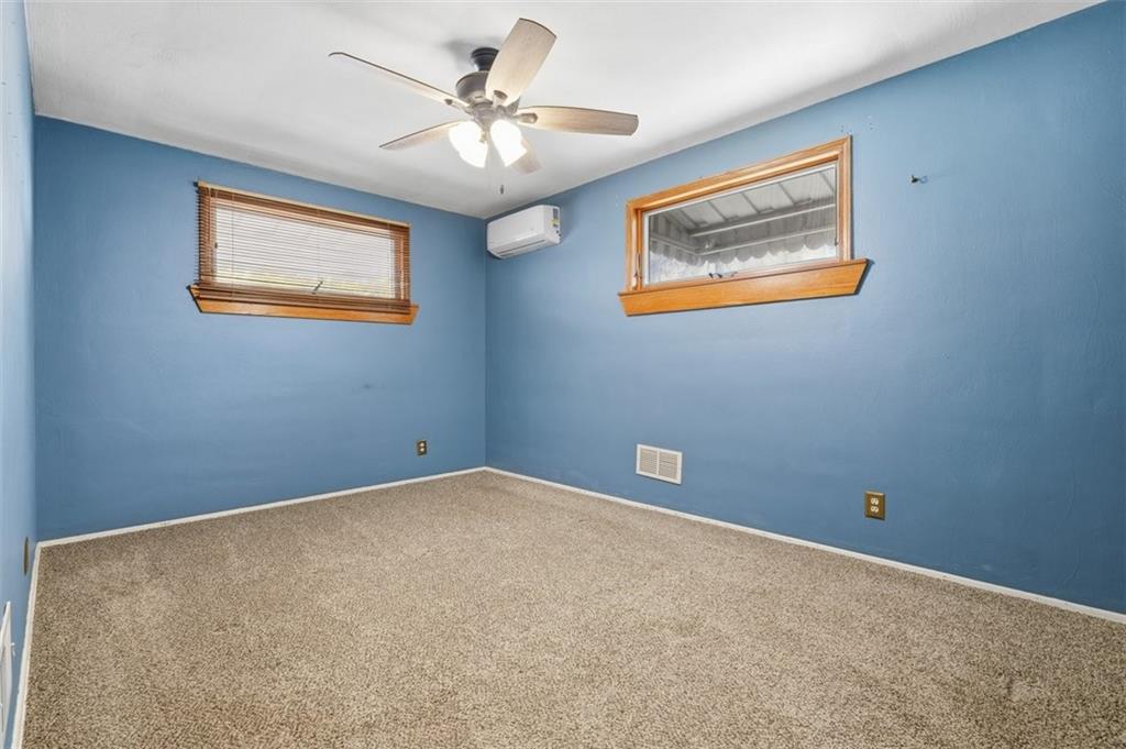 4576 Gates Drive Homestead, PA 15120 - Photo 8 of 17 a view of an empty room with a window