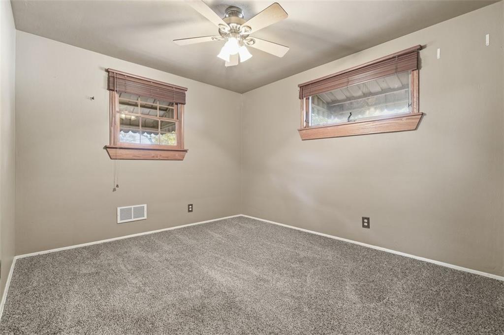 4576 Gates Drive Homestead, PA 15120 - Photo 9 of 17 a view of an empty room with a window