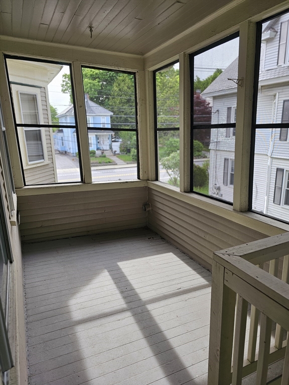 404 Stevens Street, Unit 2 Lowell, MA 01851 - Photo 2 of 12 a view of an empty room with a window