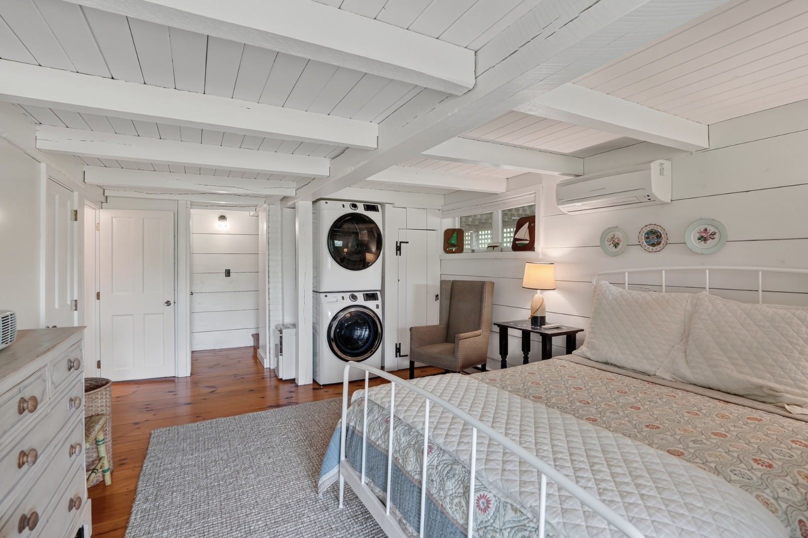 28 Black Point Road Chilmark, MA 02535 - Photo 25 of 56 Lower-level bedroom with en suite bath and sliders out to the yard.