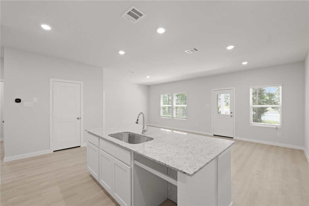 4414 Albritton Avenue Bryan, TX 77801 - Photo 12 of 30 a kitchen with sink and window