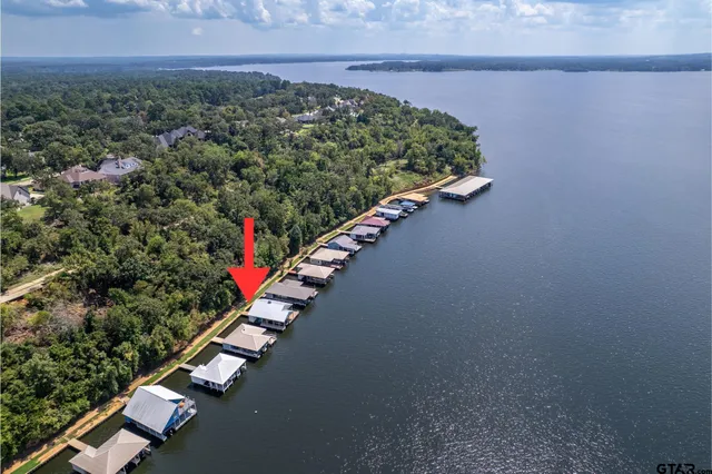 a view of a yard with wooden stairs