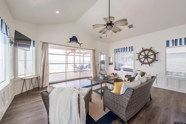 a living room with furniture and a window