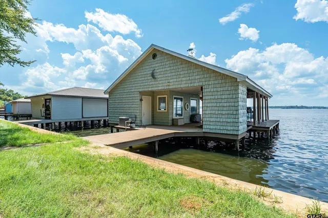 a view of backyard with a garden and entertaining space