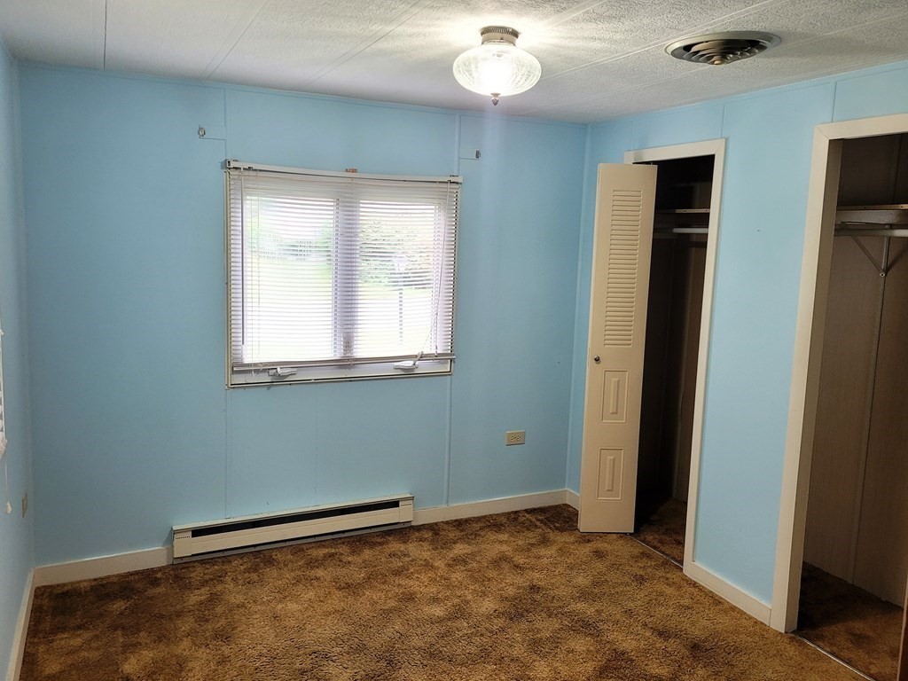 62 Longboat Road Wareham, MA 02576 - Photo 13 of 32 a view of an empty room with a window
