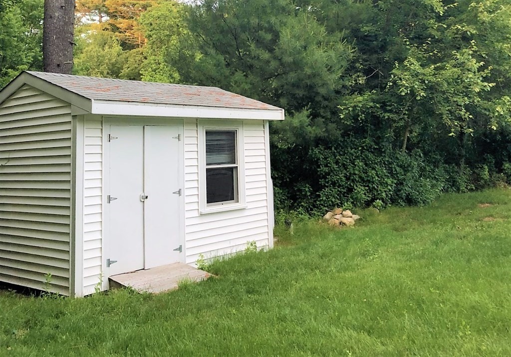 62 Longboat Road Wareham, MA 02576 - Photo 27 of 32 a view of a house with a yard