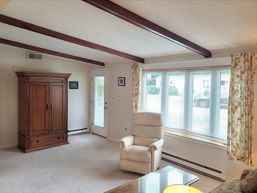 62 Longboat Road Wareham, MA 02576 - Photo 6 of 32 a living room with furniture and a window