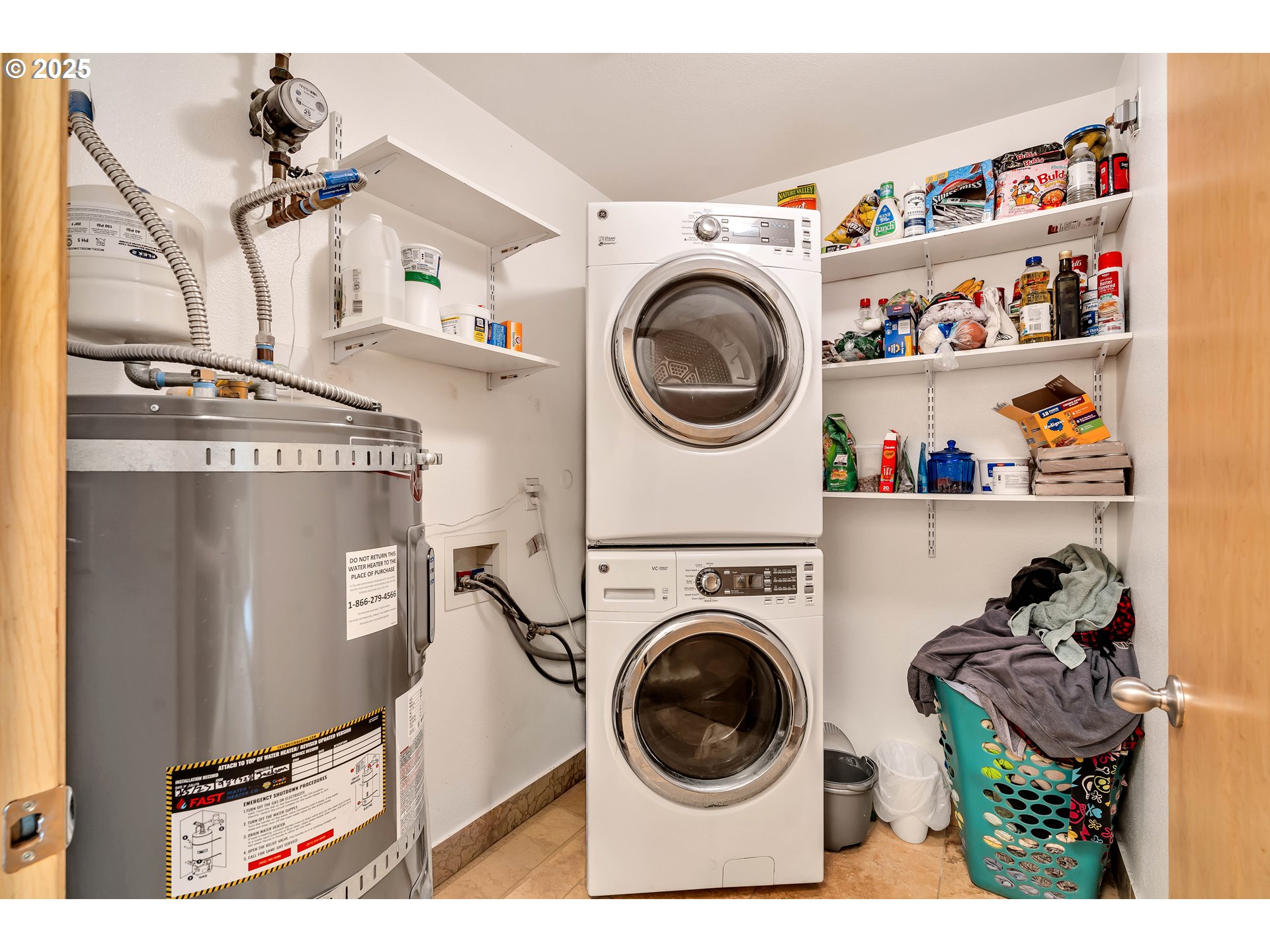 14603 Northeast 20th Avenue, Unit A105 Vancouver, WA 98686 - Photo 21 of 36 a utility room with dryer washer and a view of kitchen
