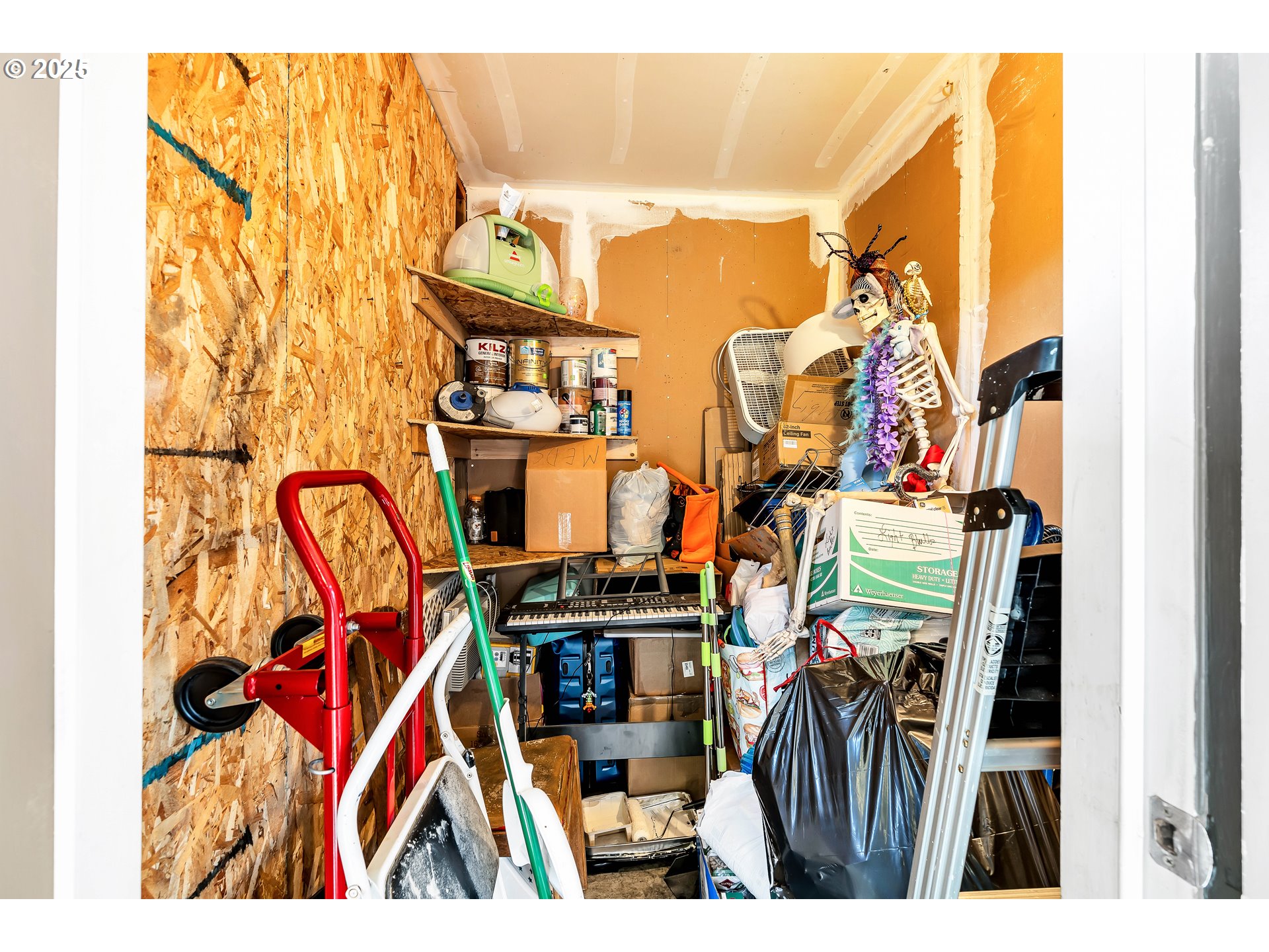 14603 Northeast 20th Avenue, Unit A105 Vancouver, WA 98686 - Photo 24 of 36 a view of walk in closet with clothes and shoes