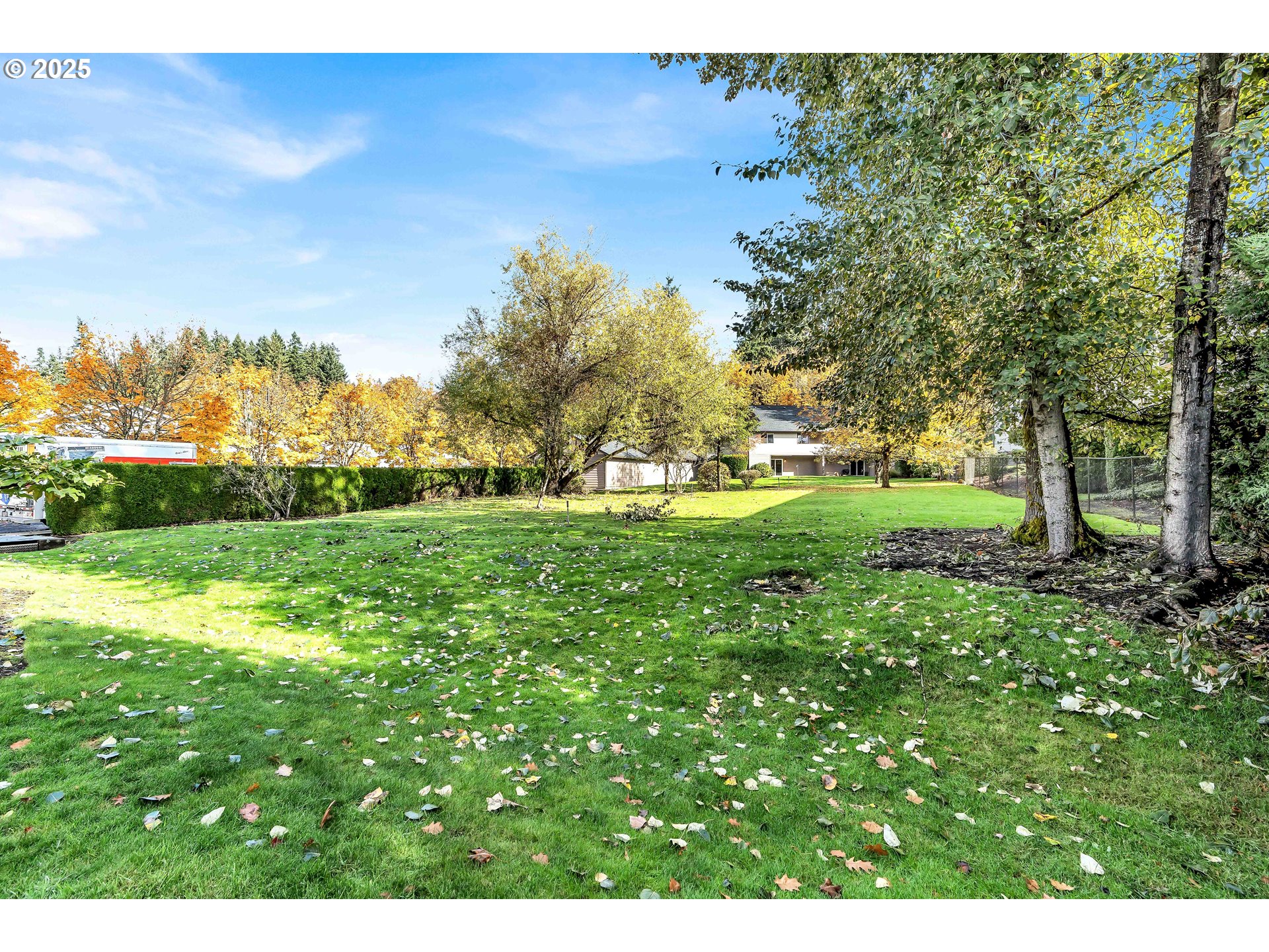 14603 Northeast 20th Avenue, Unit A105 Vancouver, WA 98686 - Photo 30 of 36 a view of a grassy field with trees