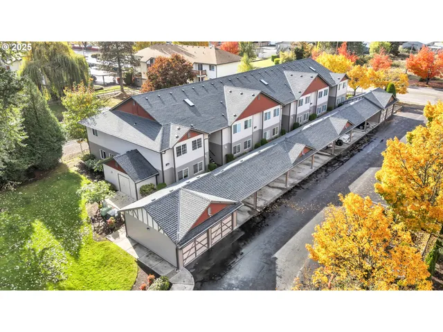 a aerial view of a house with a ocean view