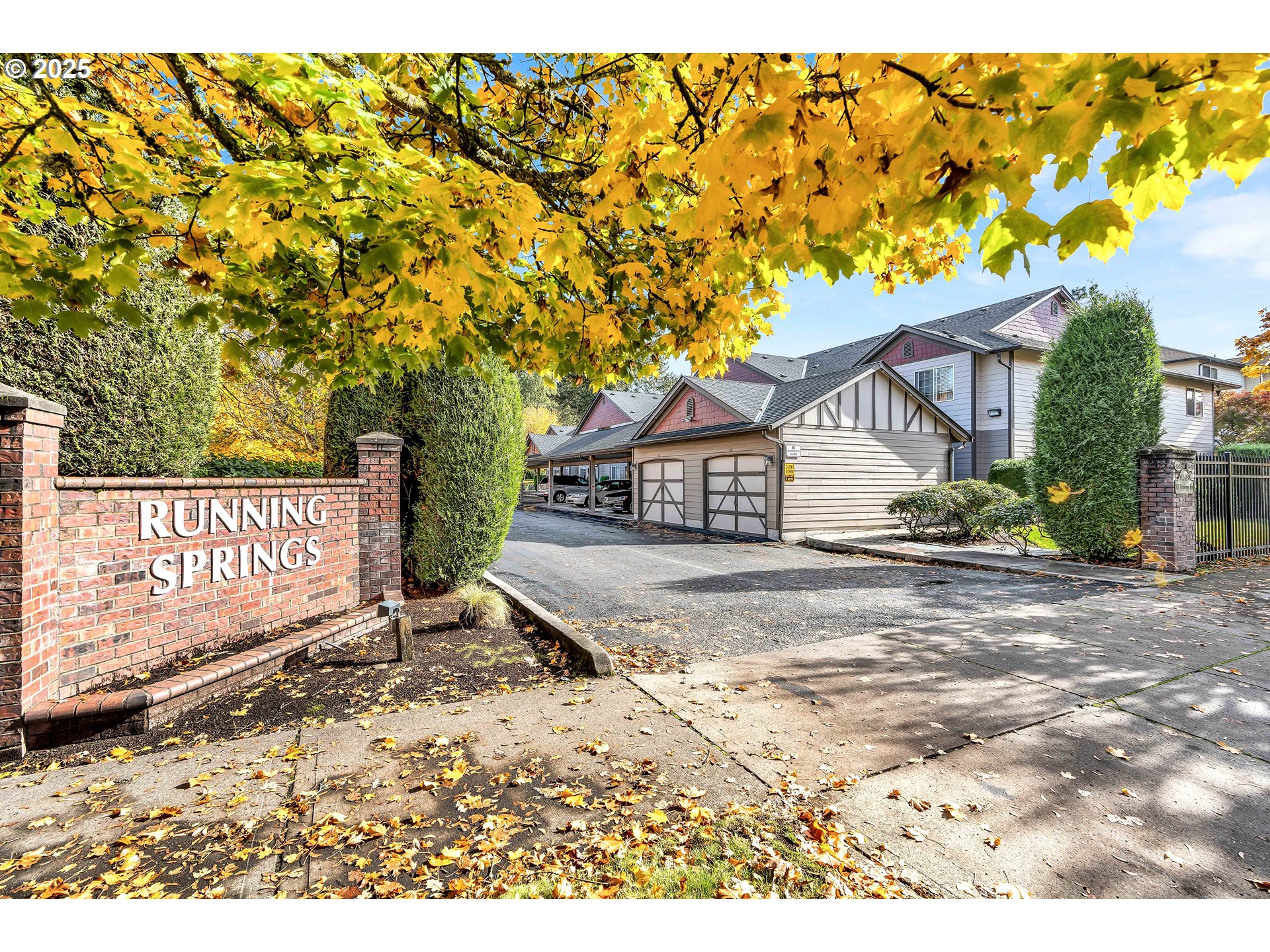 14603 Northeast 20th Avenue, Unit A105 Vancouver, WA 98686 - Photo 4 of 36 a street sign on a sidewalk next to a road