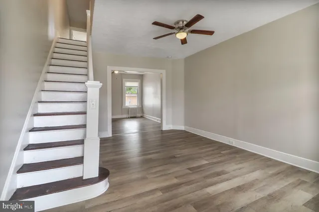 a view of entryway with wooden floor