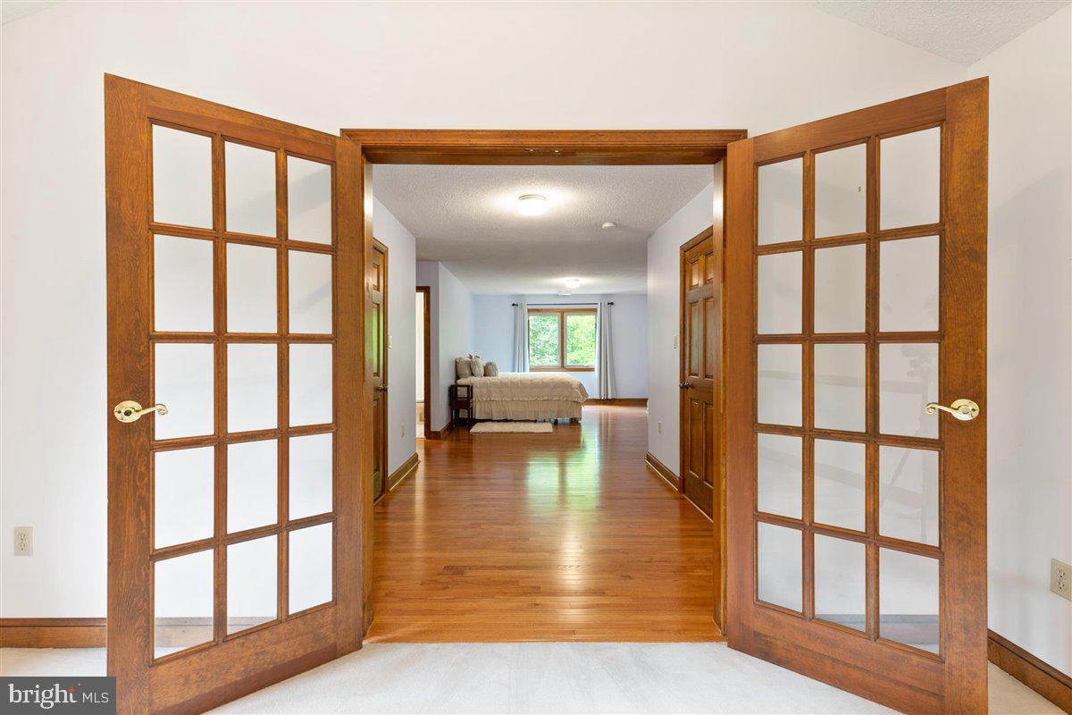43534 Spinks Ferry Road Leesburg, VA 20176 - Photo 33 of 75 French Doors from Loft to Bedroom