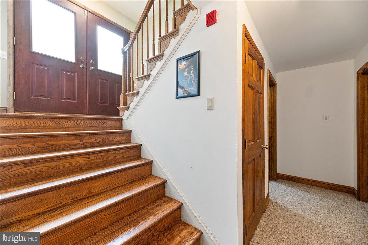 43534 Spinks Ferry Road Leesburg, VA 20176 - Photo 40 of 75 Stairs off of foyer with Access to back Patio