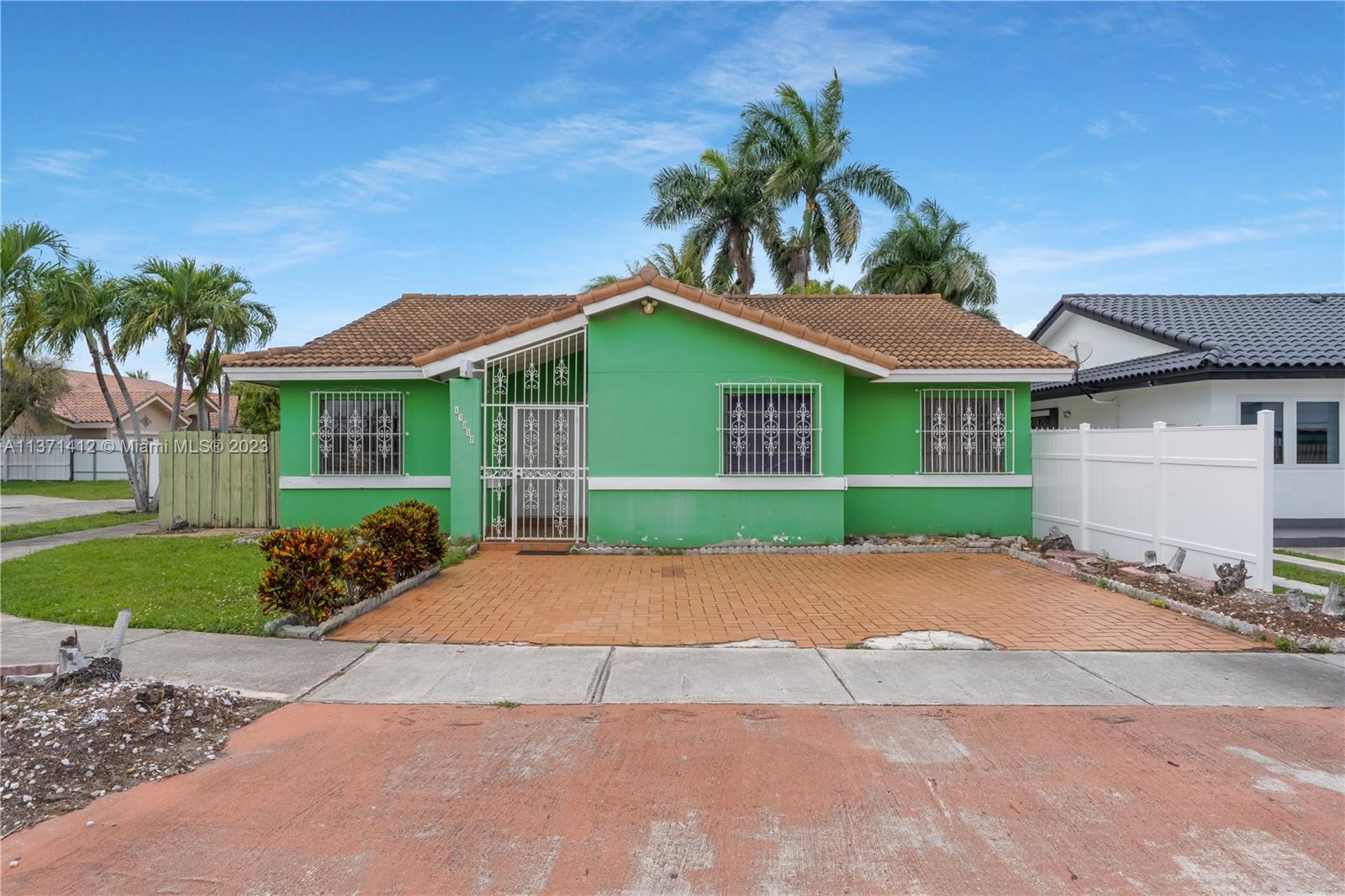 13817 Southwest 21st Terrace Miami, FL 33175 - Photo 1 of 37 a house with yard and a outdoor space