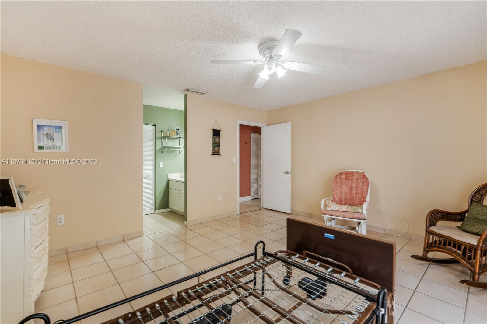 13817 Southwest 21st Terrace Miami, FL 33175 - Photo 22 of 37 a living room with furniture
