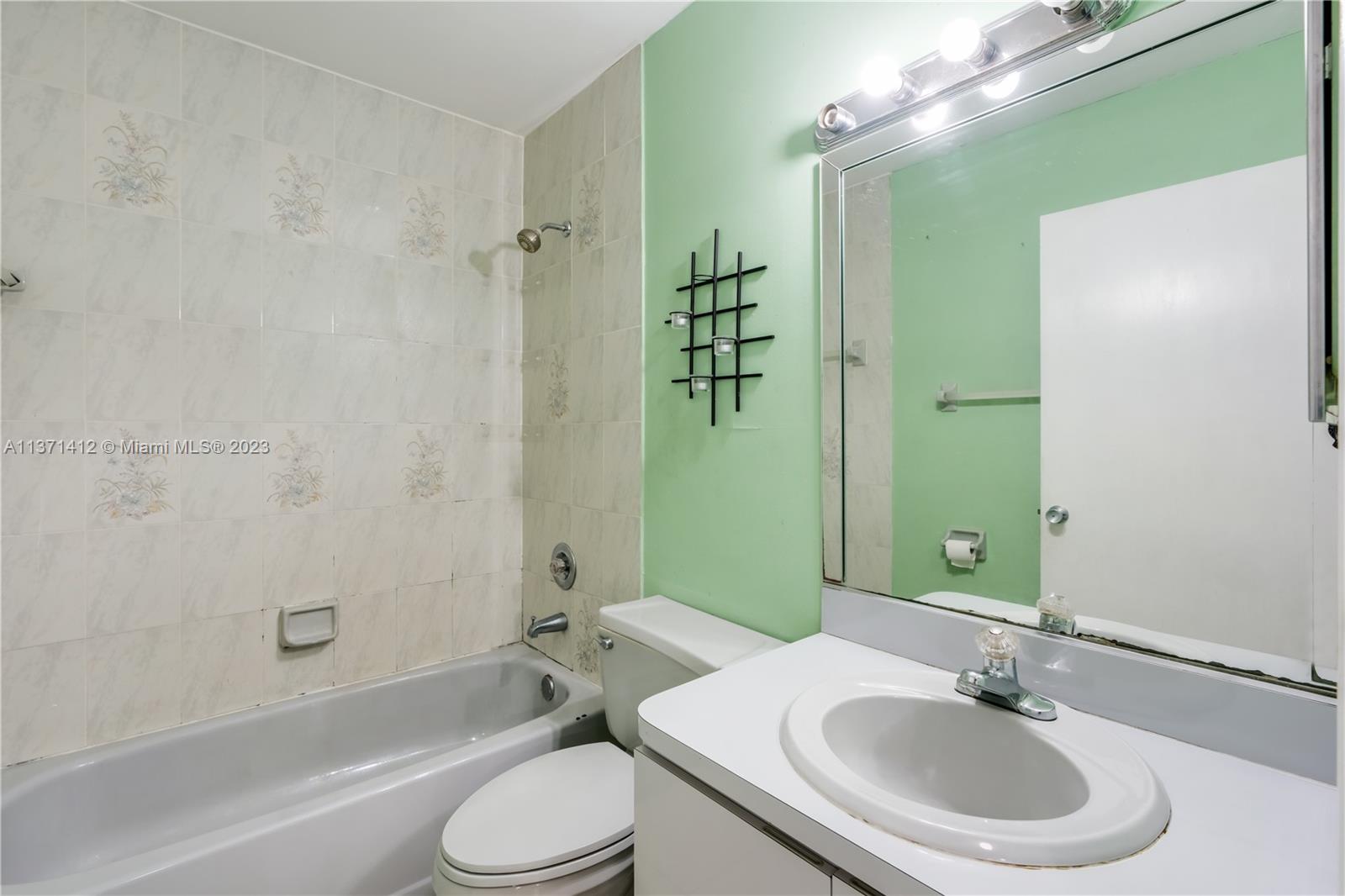 13817 Southwest 21st Terrace Miami, FL 33175 - Photo 26 of 37 a bathroom with a sink toilet and shower