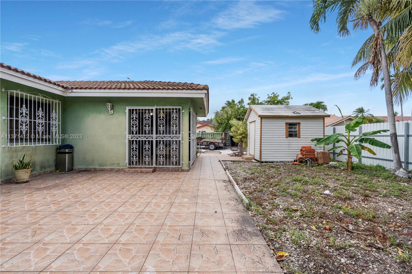 13817 Southwest 21st Terrace Miami, FL 33175 - Photo 33 of 37 a view of a house with a patio