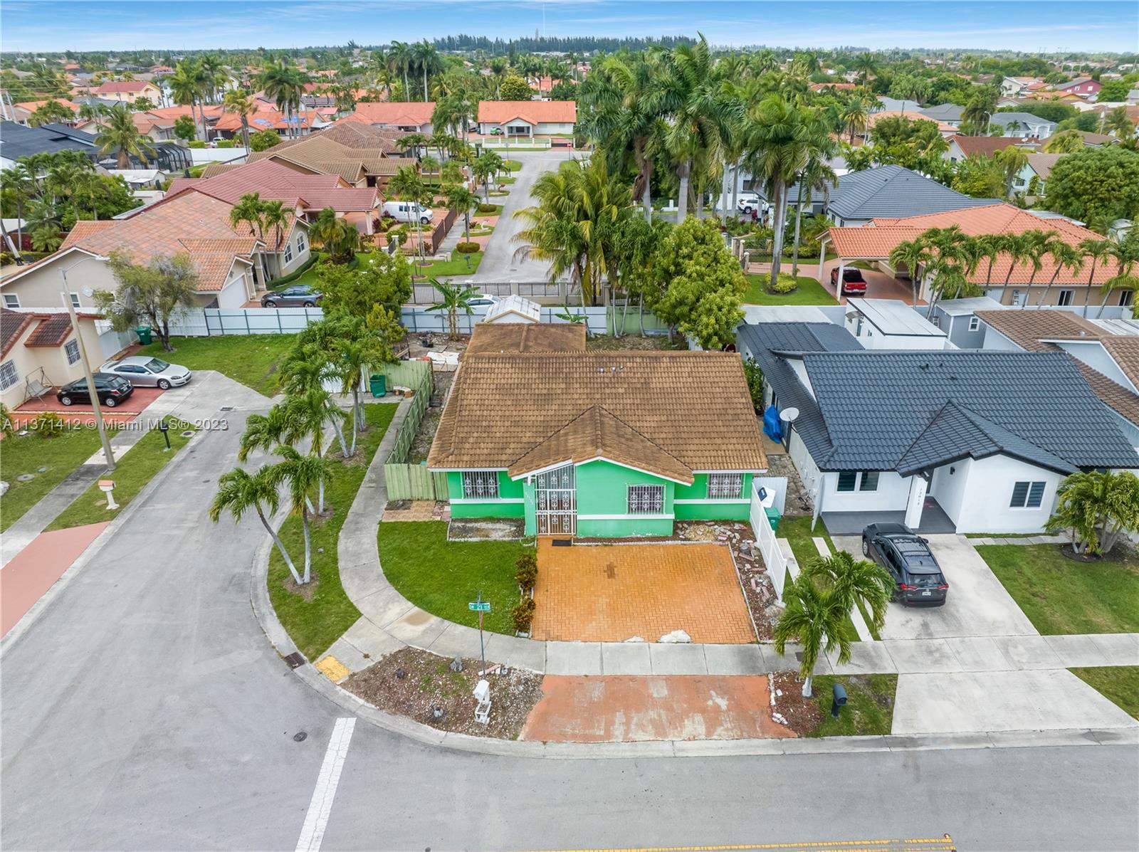 13817 Southwest 21st Terrace Miami, FL 33175 - Photo 36 of 37 an aerial view of a house with a garden and swimming pool