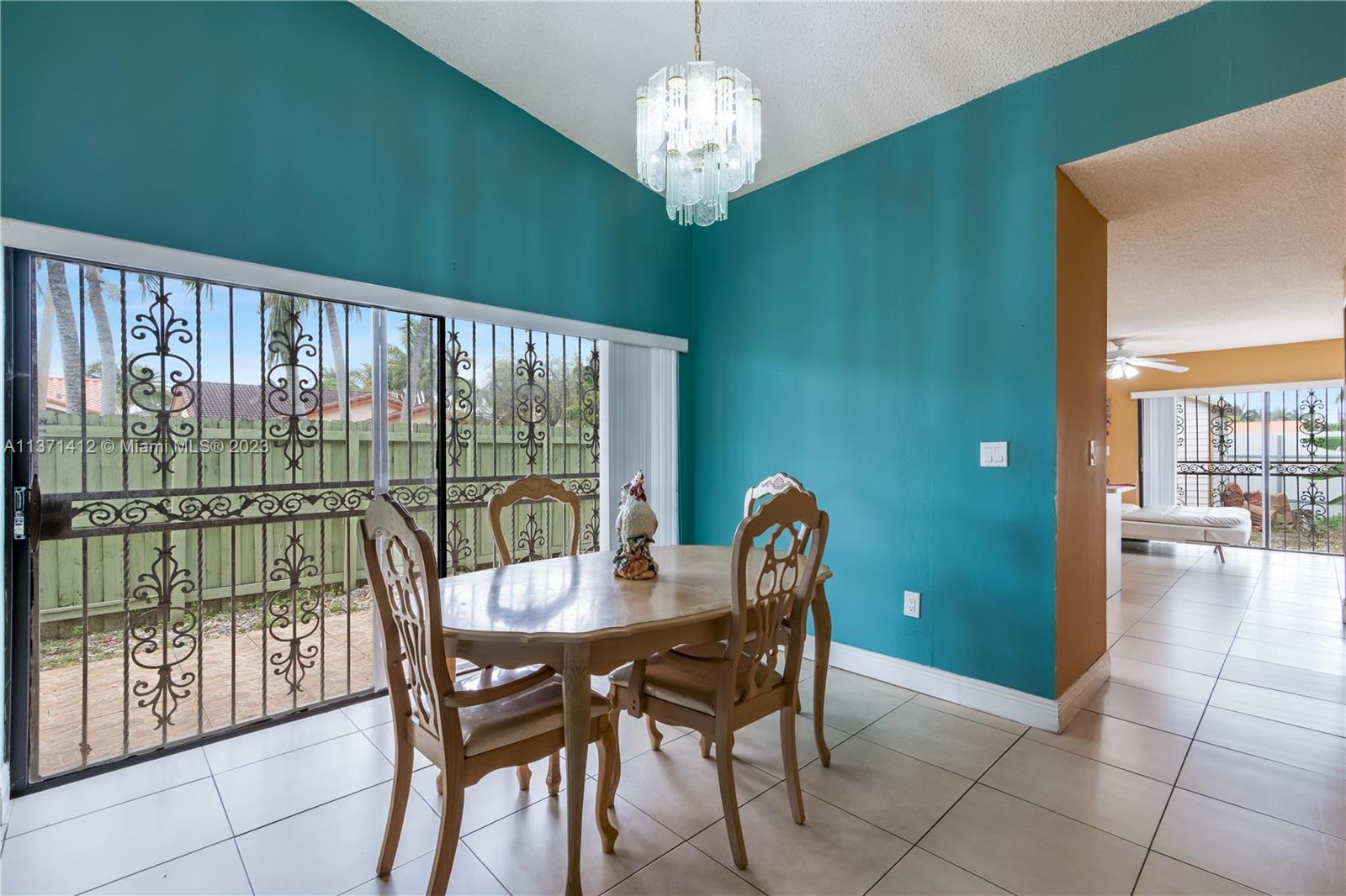 13817 Southwest 21st Terrace Miami, FL 33175 - Photo 9 of 37 a view of a dining room with furniture window and outside view