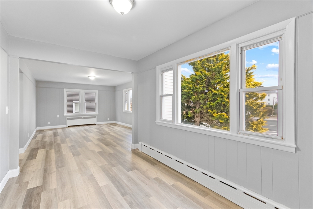 1039 South Main Street Fall River, MA 02724 - Photo 16 of 39 a view of an empty room with a window