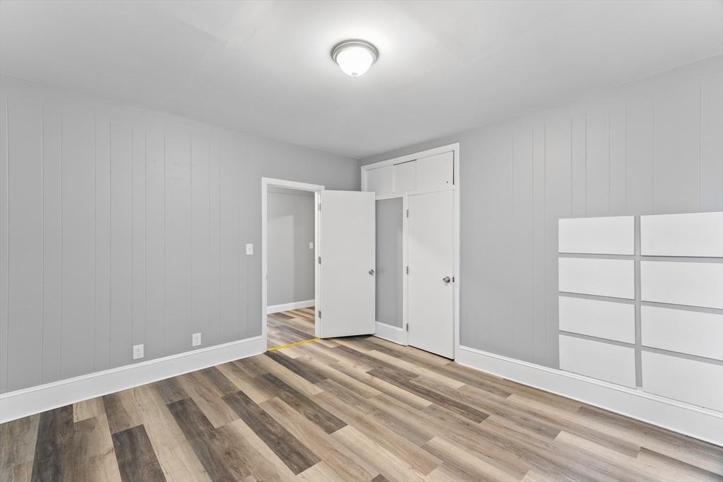 1039 South Main Street Fall River, MA 02724 - Photo 17 of 39 a view of a livingroom with wooden floor