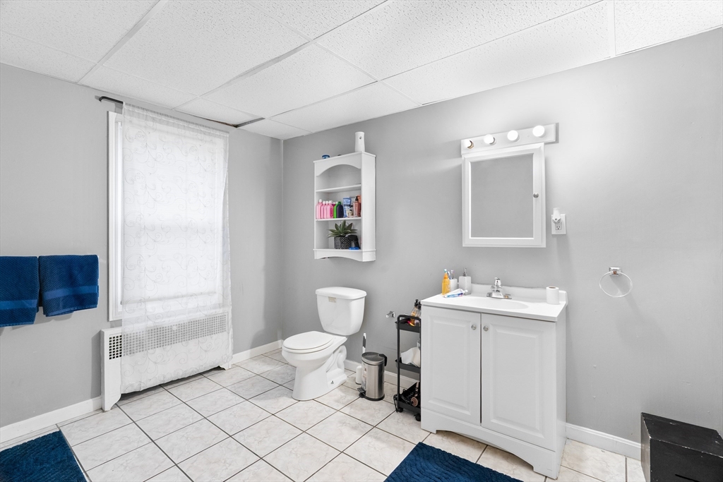 1039 South Main Street Fall River, MA 02724 - Photo 28 of 39 a bathroom with a sink toilet and shower