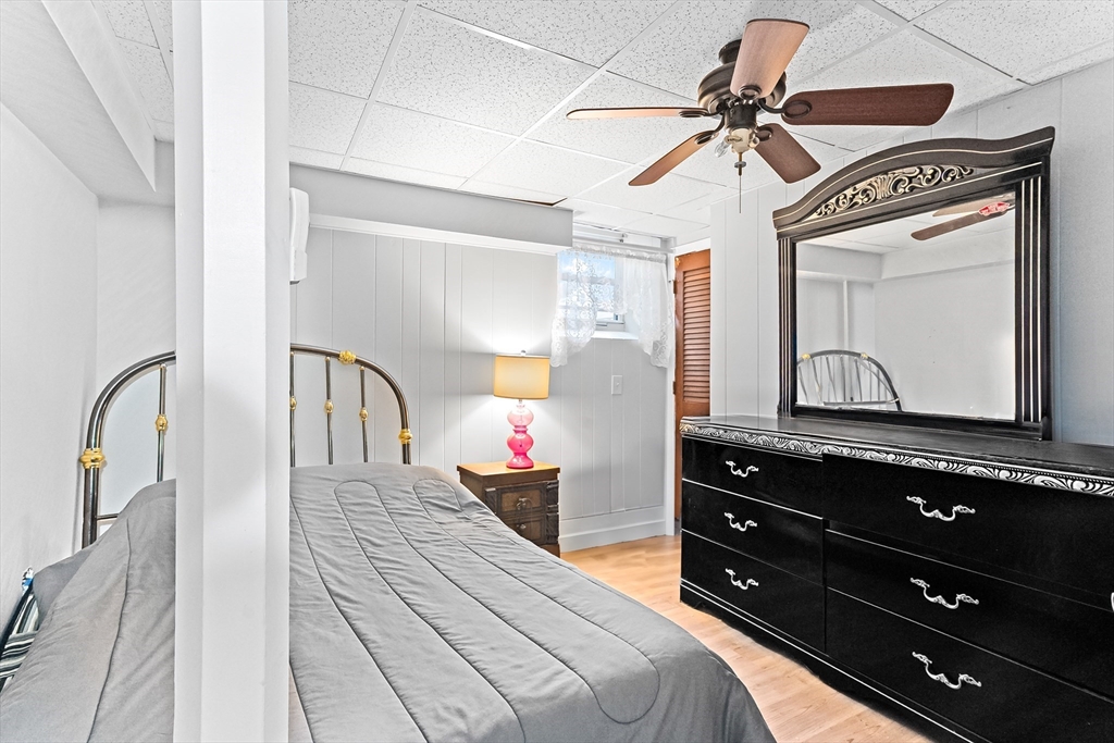 1039 South Main Street Fall River, MA 02724 - Photo 30 of 39 a bedroom with a bed and a dresser