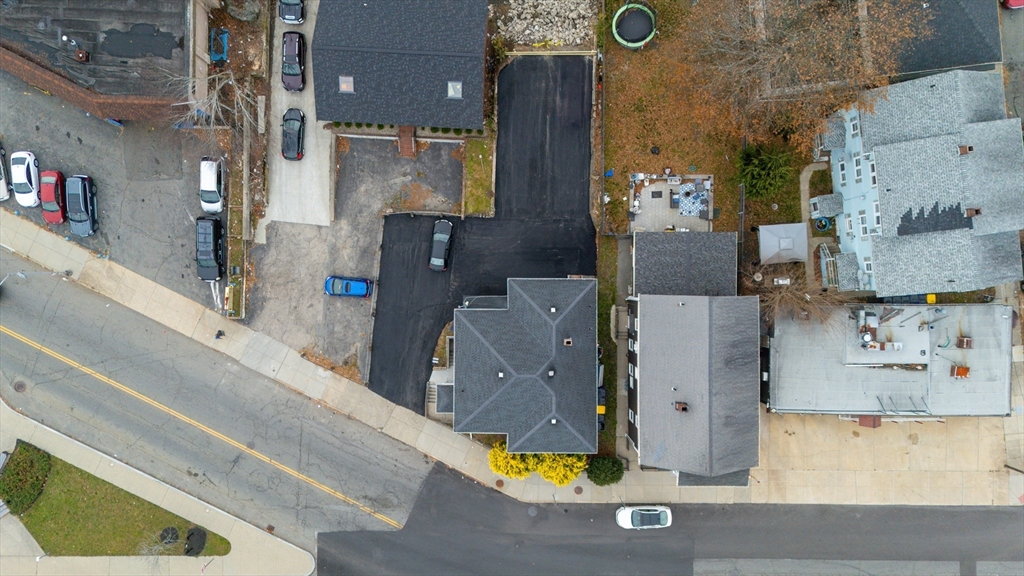 1039 South Main Street Fall River, MA 02724 - Photo 38 of 39 an aerial view of residential houses with outdoor space
