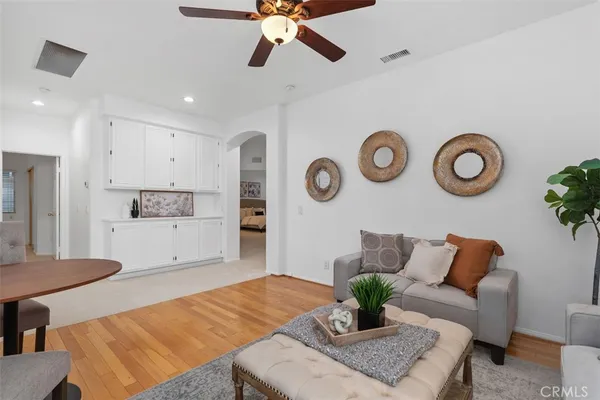 a living room with furniture and rug