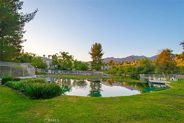 a view of a lake with a big yard