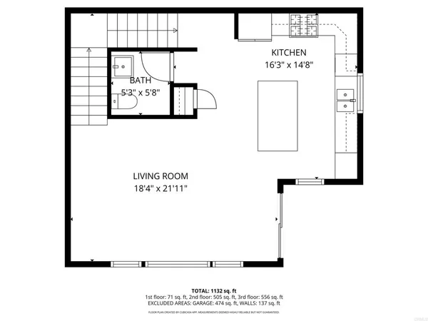 a picture of a bench in front of a wall