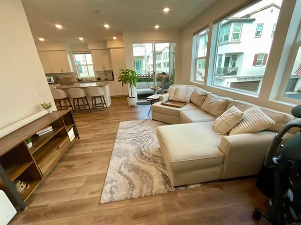 a living room with furniture and a table