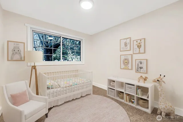a bedroom with furniture and a window