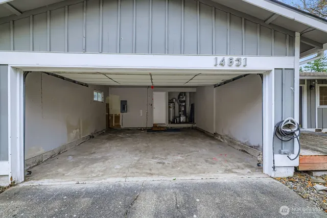 a bathroom with a sink and cabinets