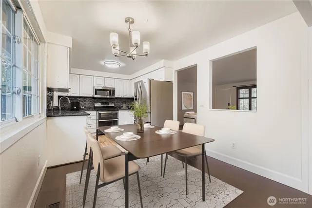 a view of a dining room with furniture